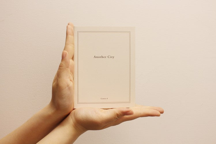 Another City: Booklet (2009)